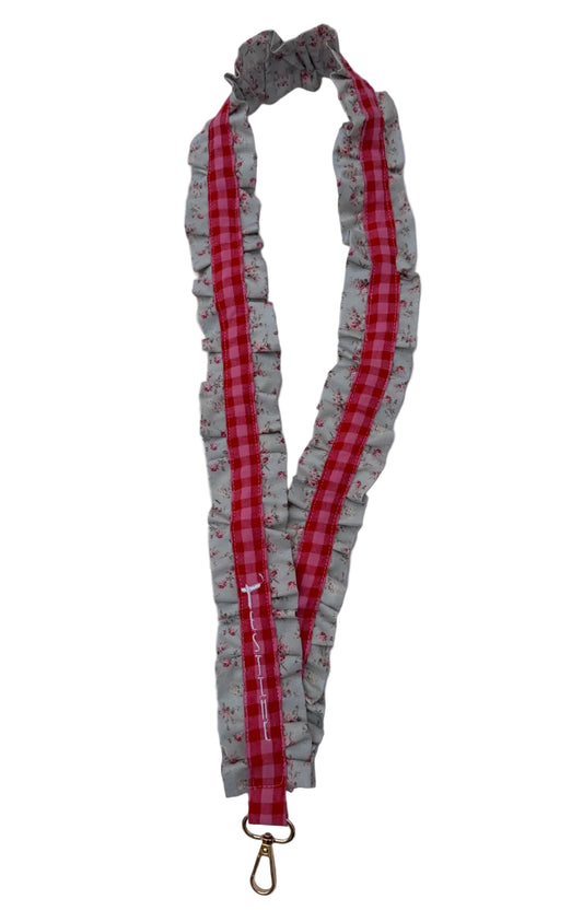 Cuelga móvil volantes rosa