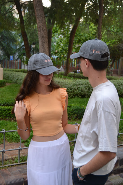 GORRA SER LUZ GRIS