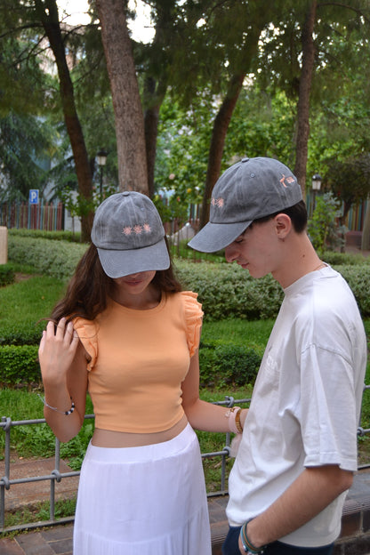 GORRA SER LUZ GRIS